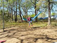 Back at camp, Hudson relaxes on his hammock