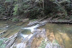 The river cut through all the tilted beds of stone